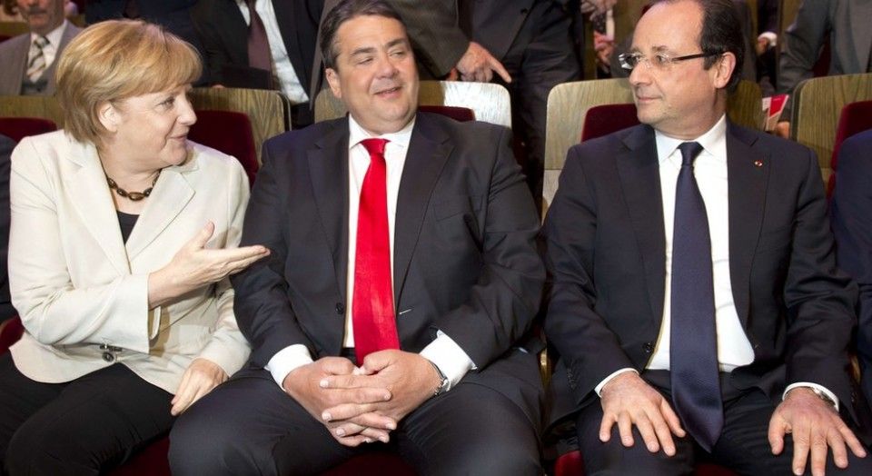 Lui Hollande (dreapta) i-ar conveni un guvern de larga uniune nationala in Germania